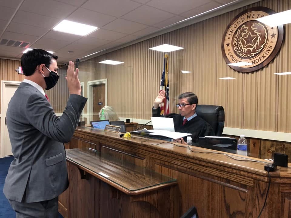 Zach taking an oath in a Hopkins County courtroom